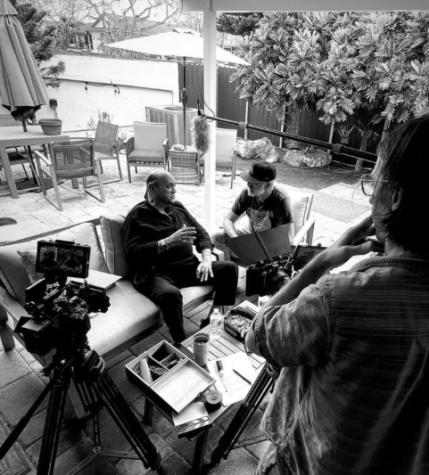 Behind-the-scenes photograph of a filmed interview with Louie Ippolito